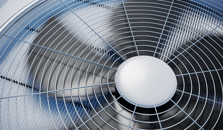 Close up view on HVAC unit fan | Pro Comfort Heating & Cooling