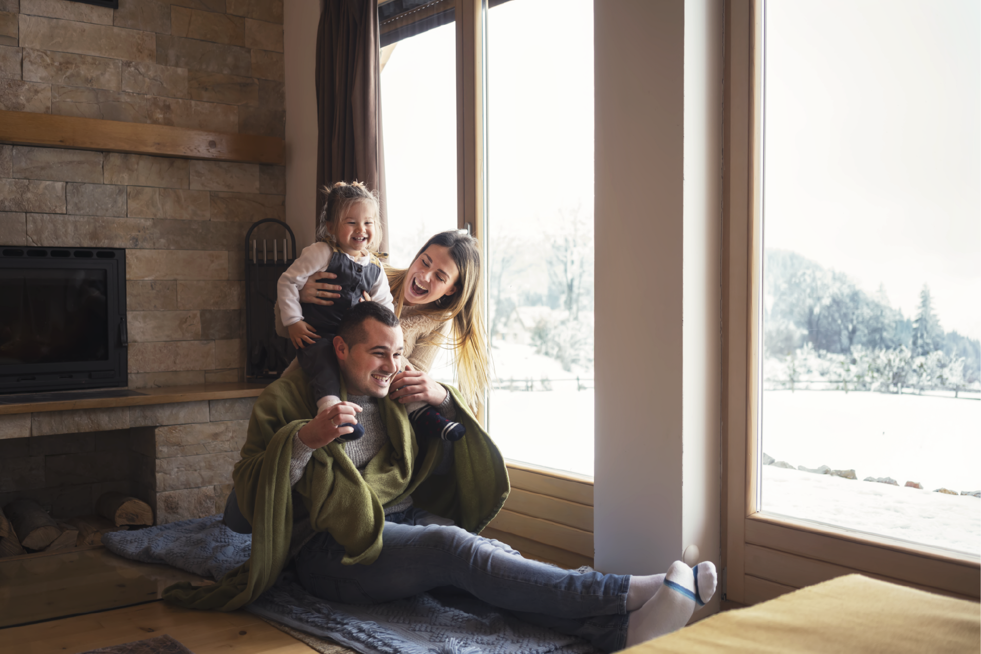 Happy Family in their living room | Pro Comfort Heating & Cooling